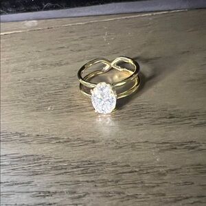 Gold over sterling oval cut moissanite ring
